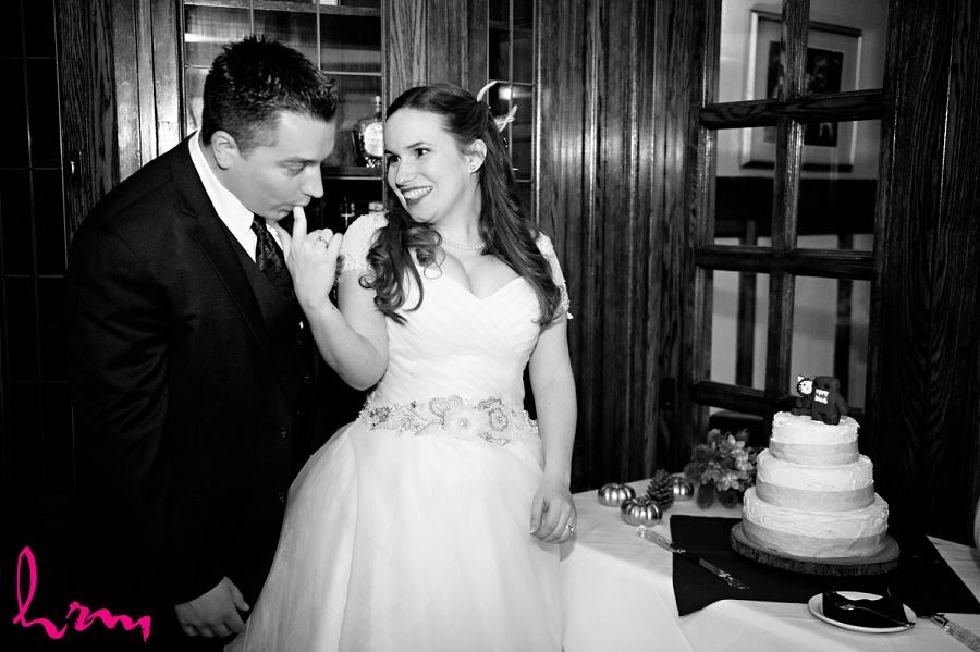 Trying the cake at Windermere Manor London ON Wedding Photography